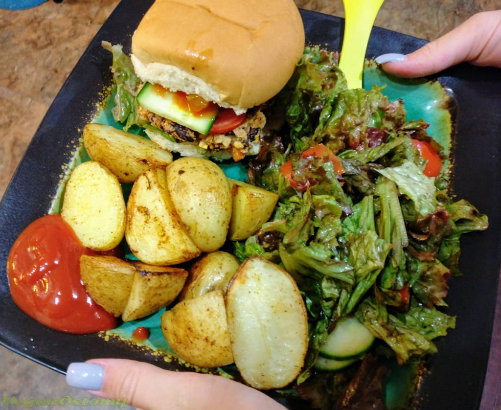 Bean burger with roasted potatoes and salad