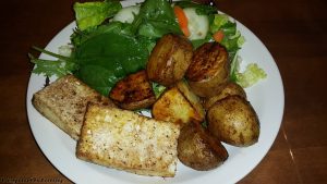 Tofu with potatoes and salad